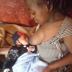 Chantale breastfeeding her son 1