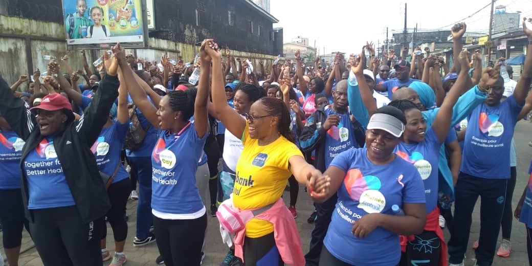 Health Walk with the MD of Ecobank (right) next to the lady in Yellow Tee, championing the slogan ‘‘Together for better Health’(1) (1)