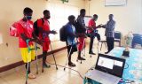 The CAF on behalf of CBCHS handing another finacial support to the Regional Amputee Football team during a meeting in Bamenda