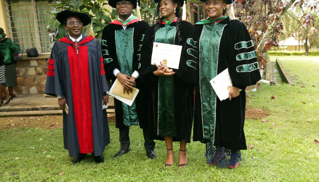 Graduates pose with Prof. Njamnshi Alfred