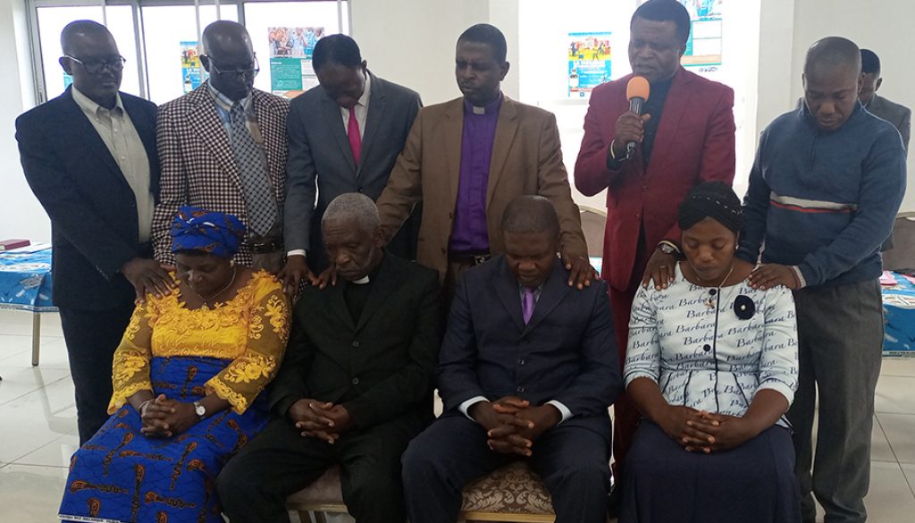 CBC Church Ministers praying for pastors and wives