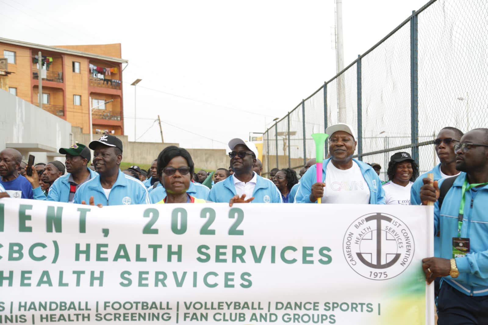 Administrators leading the sports walk into the Bamendzi stadium