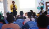 Dr Fozao Mbi Vanessa delivering empowering adolescent girls on the use of their bodies
