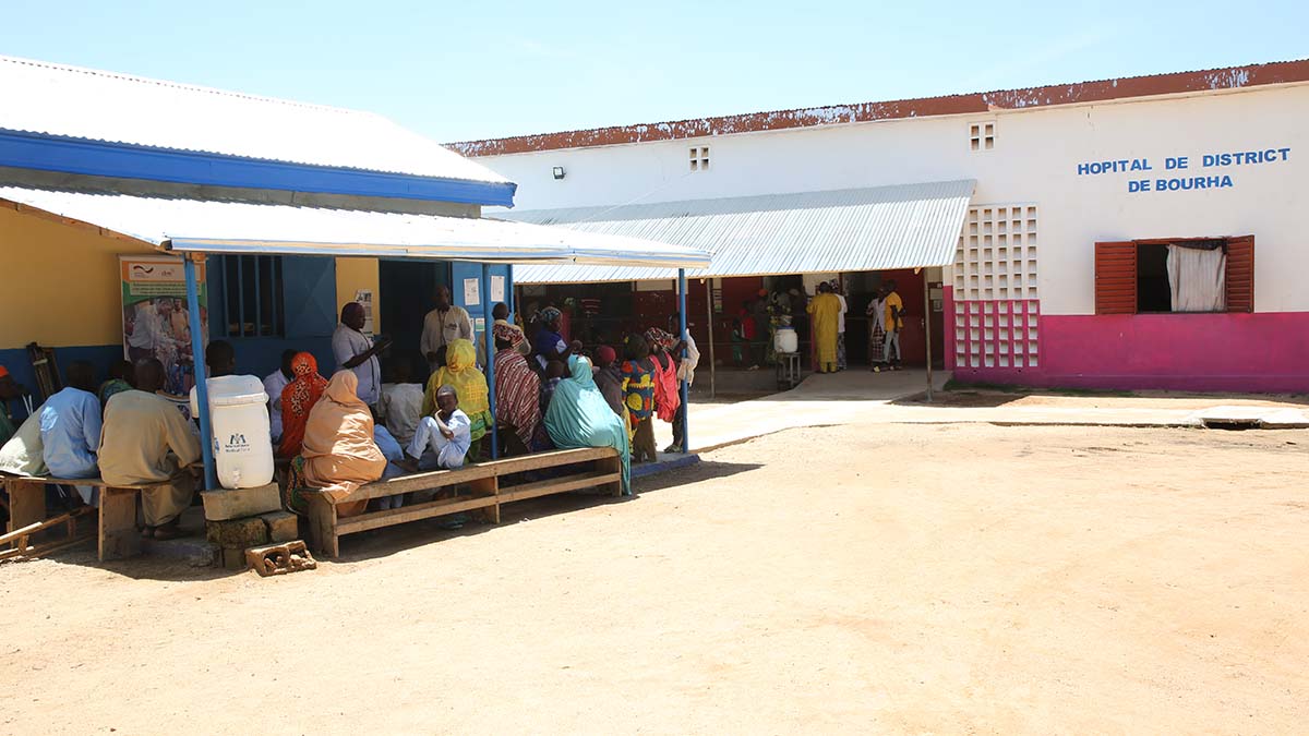 A view of the Bourha District Hospital with patients awaiting consultation