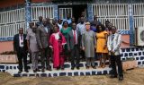 Stakeholders pose in support of services to persons with disabilities in West region-min