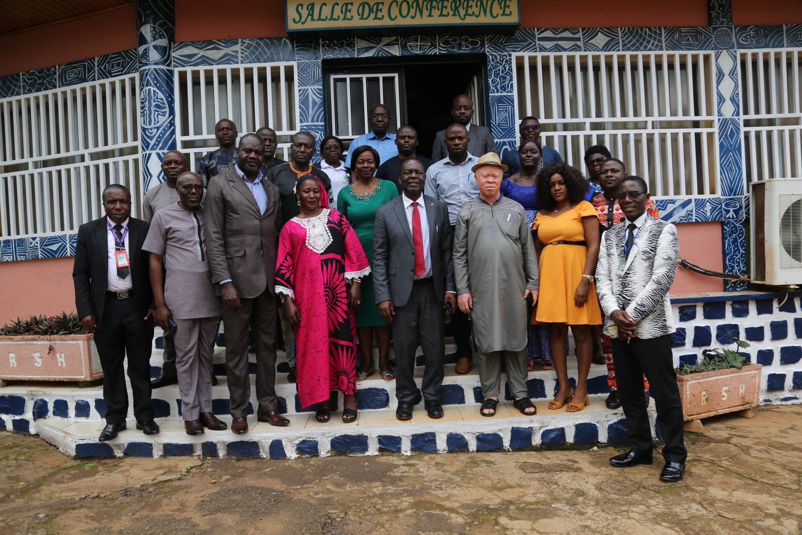Stakeholders pose in support of services to persons with disabilities in West region-min