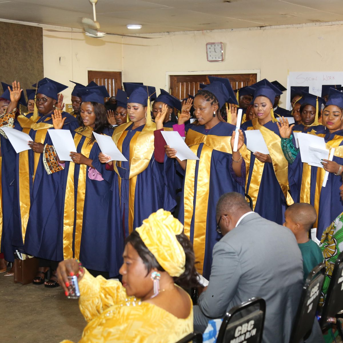 Graduating social workers taking the oath of confidentiality