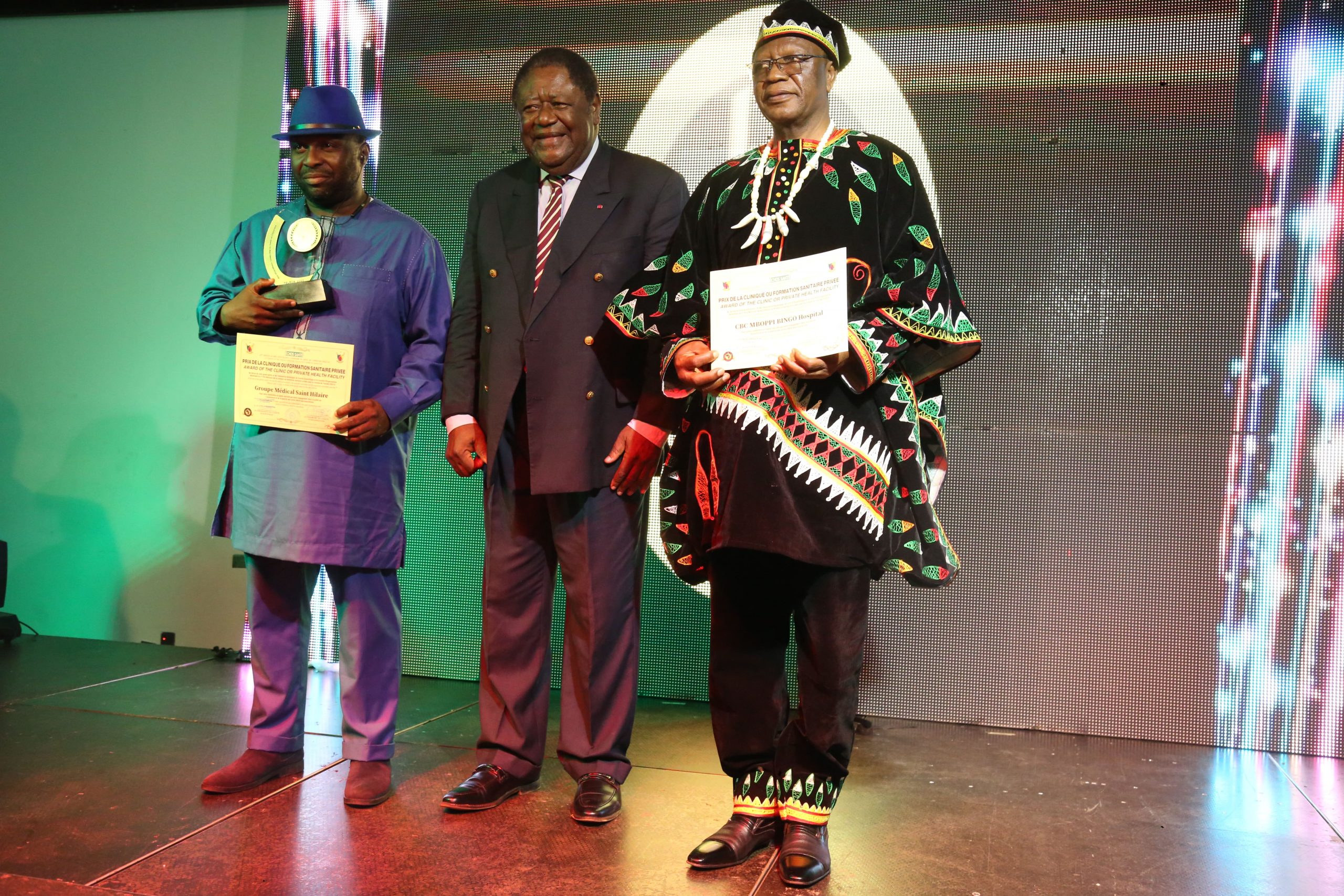 The Administrator, Mr. Yongwa Zaccs (right) receives award Mboppi Baptist Hospital Douala