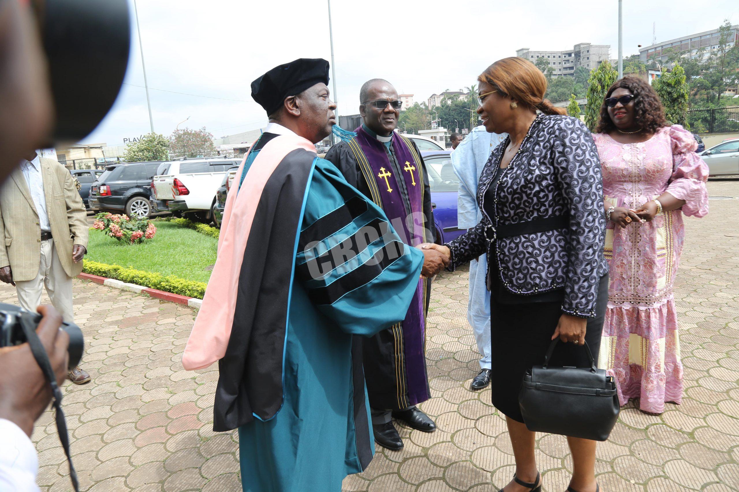 Director of CBCHS Pr Tih Pius Muffih welcoming H.E. Mme Pauline Irene Nguene to the graduation ground