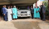 Family photo of Emmanuel Sisters and Leaders of the CBCHS with newly offered vehicle