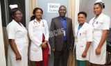 NBH Skin Clinic Team celebrates its Launch! Dr. Nji Nancy (second from left) Stands with Hospital Administrator Mr. kangong Joce and other team members
