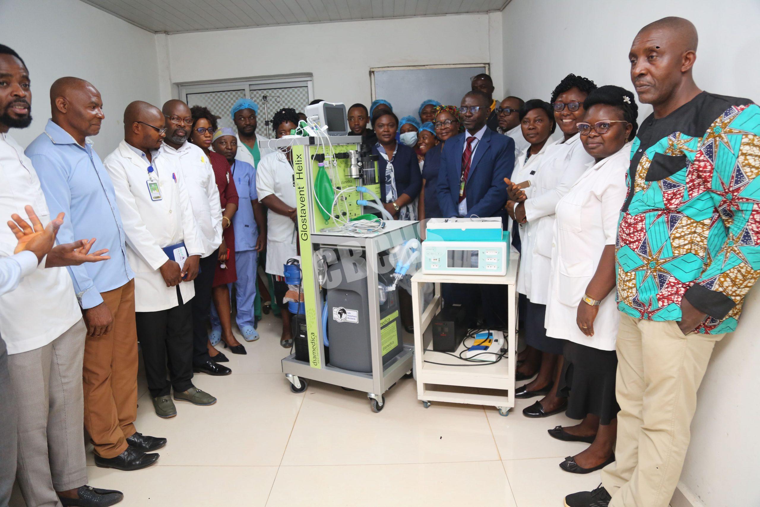 Hospital leadership pose to celebrate the new machines