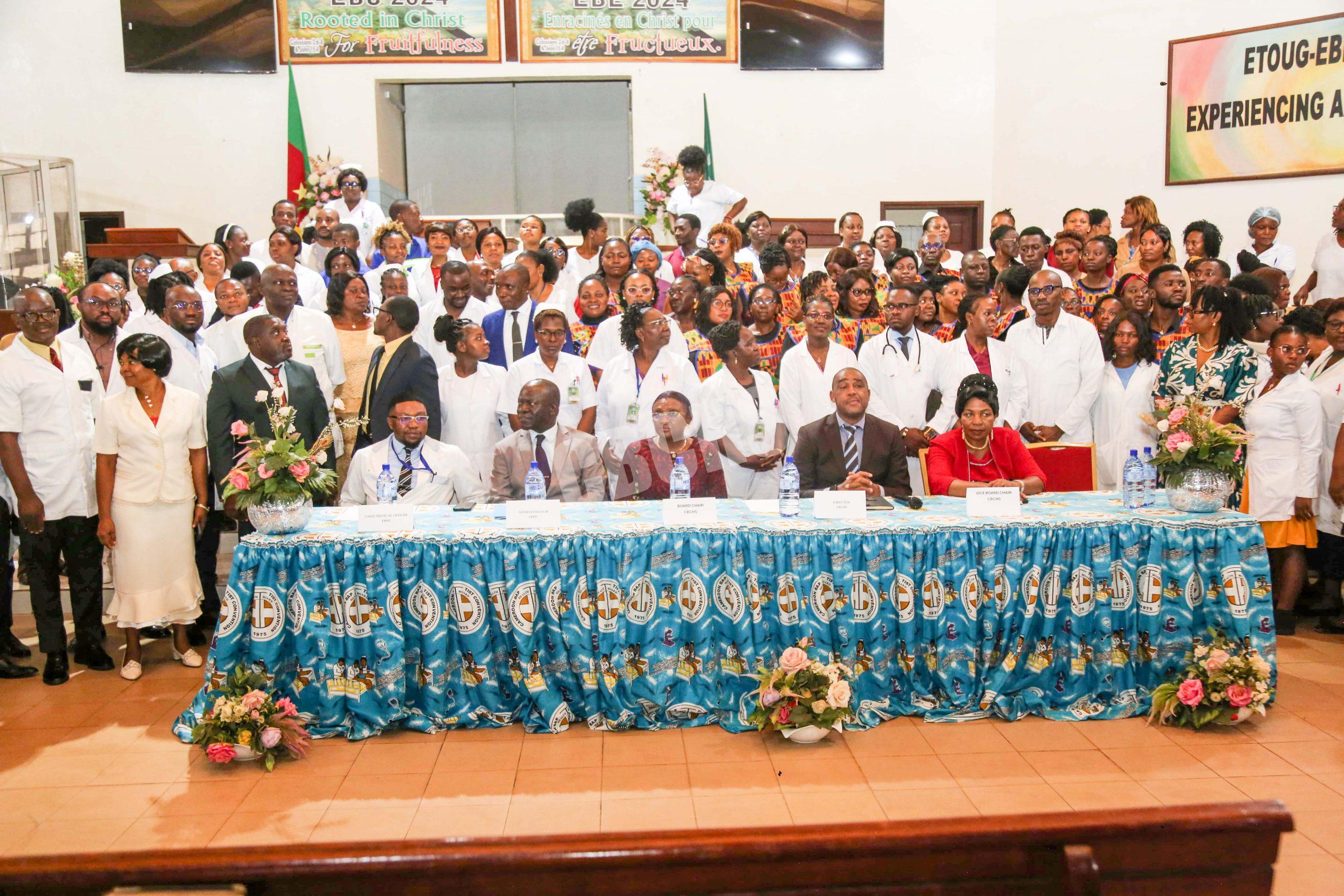 Staff of Etougebe Baptist Hospital pose with DHS & team