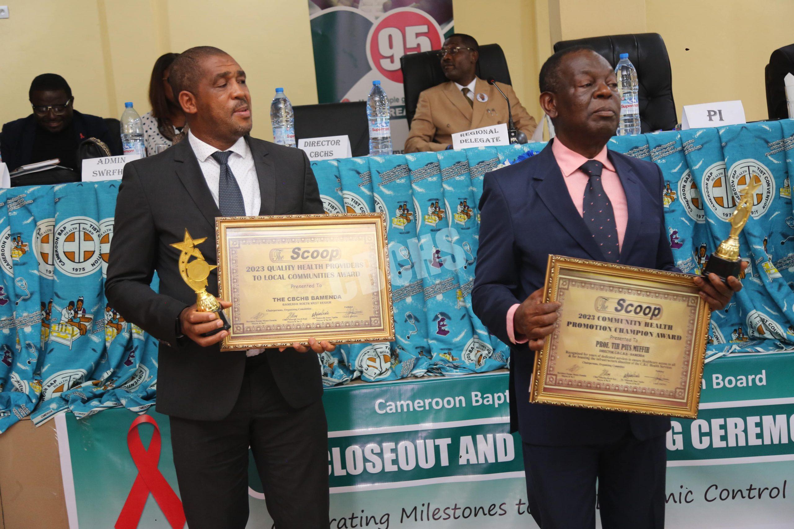 DHS & PI brandishing awards from Scoop Media Group