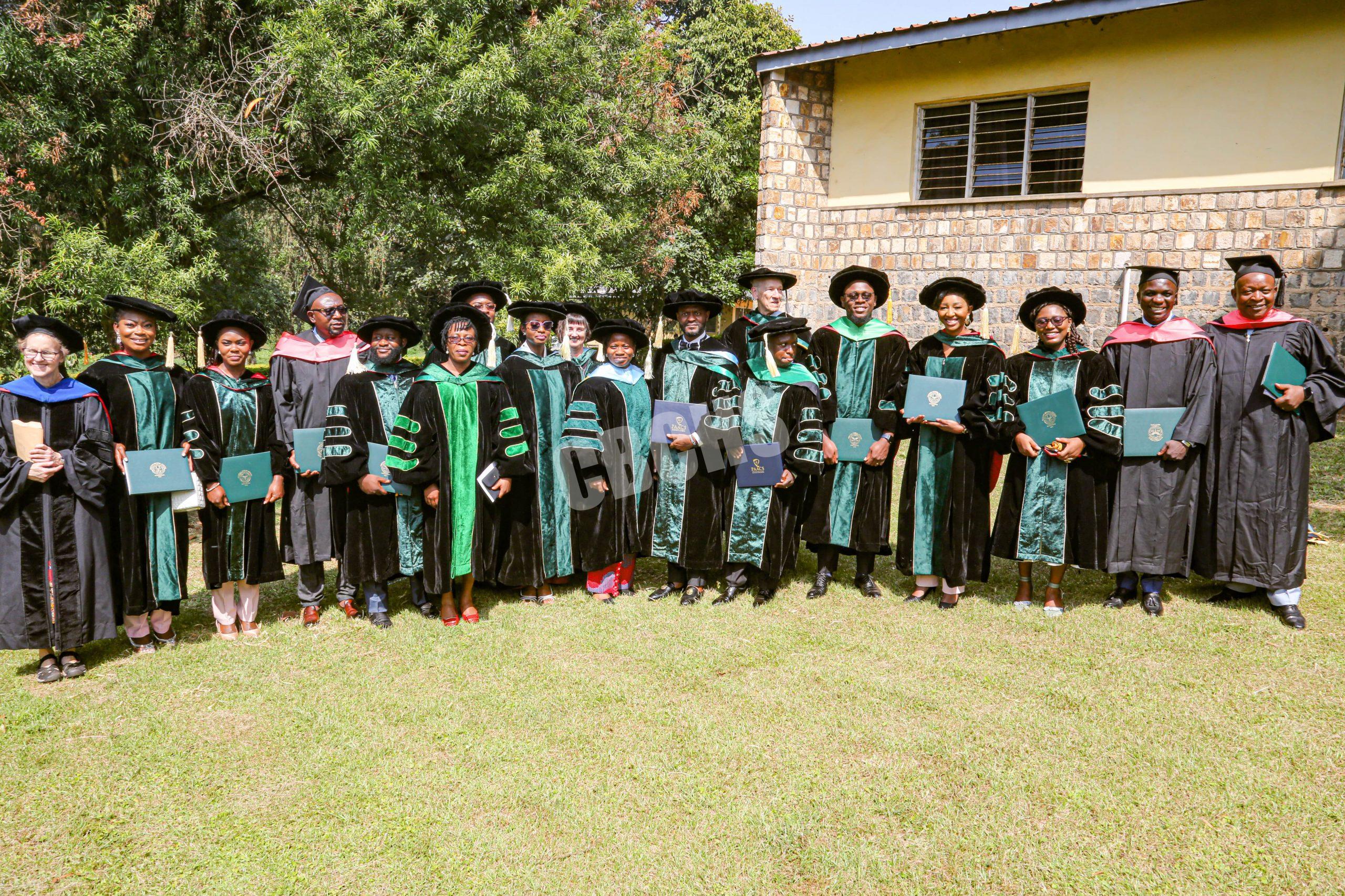 Graduates and faculty pose for posterity