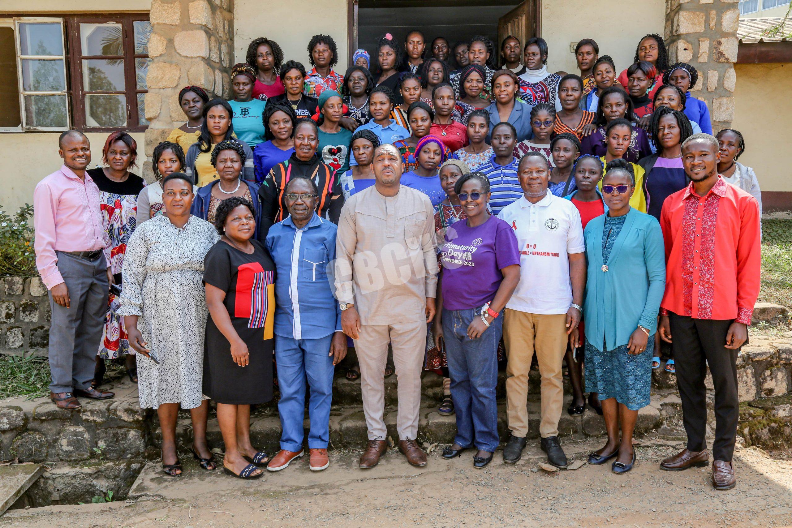 Workshop participants pose with DHS & leaders