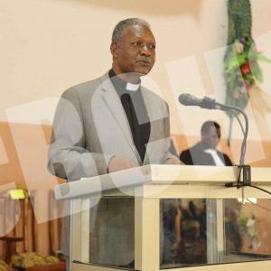 Rev. Dr. Donalld Ndichafah reading Scriptures