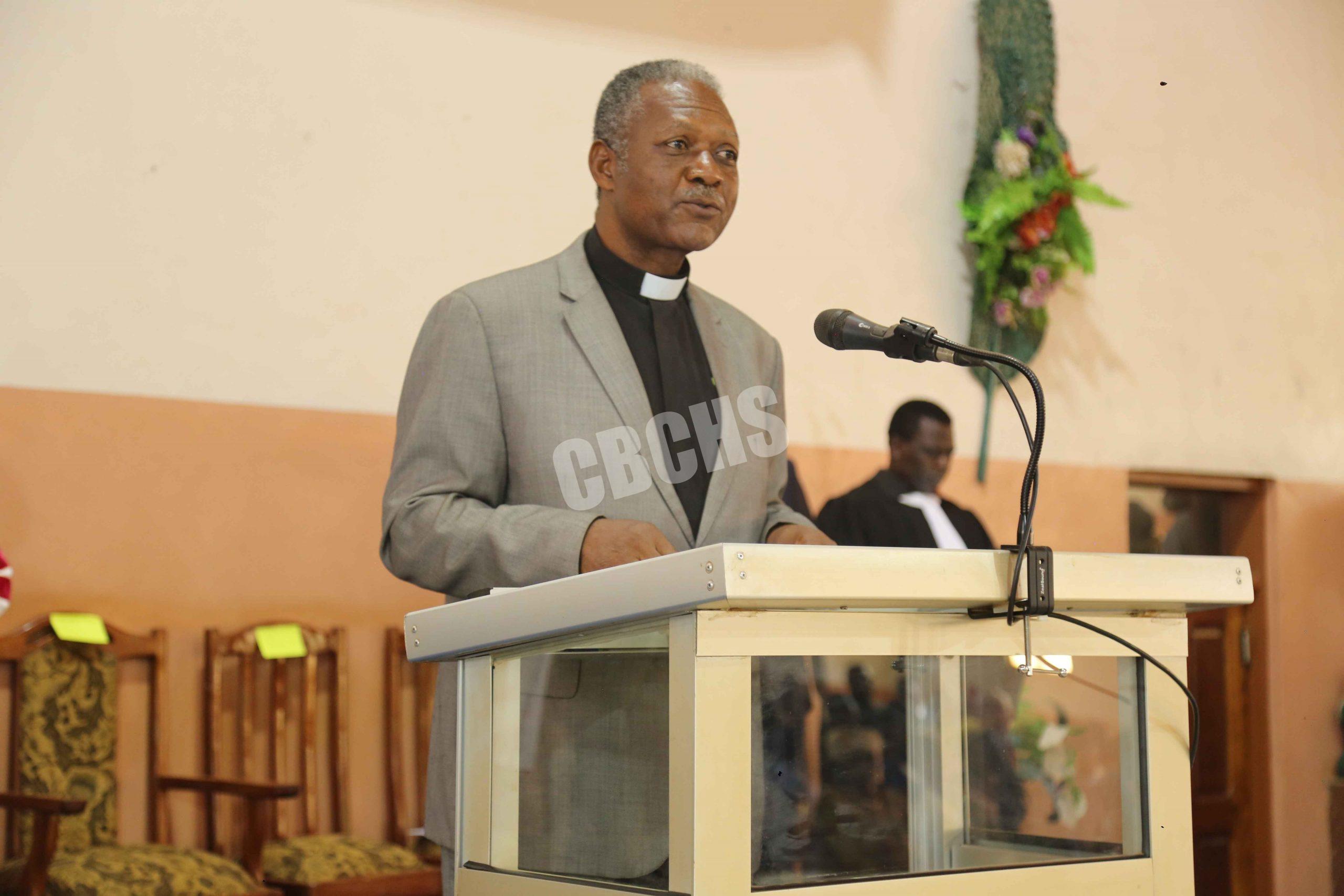 Rev. Dr. Donalld Ndichafah reading Scriptures