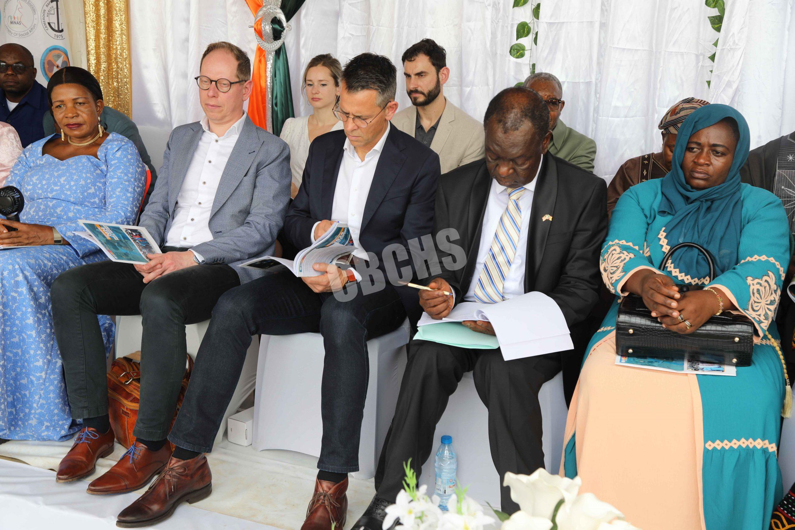 Eversdijk (AFAS Foundation) and Ackerman (Liliane Foundation) seating closey to Prof Tih at the event.