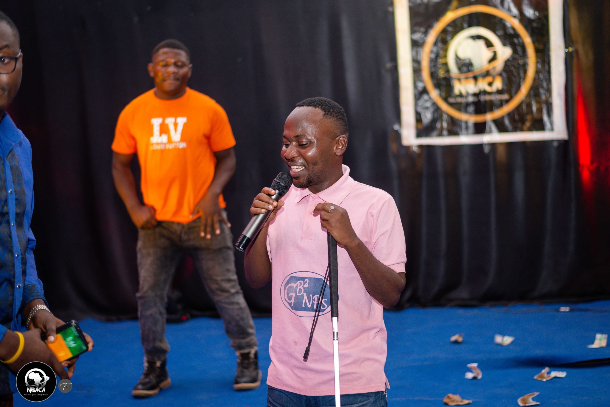 Nsah Edwin, Journalist and Musical Artist in a stage performance