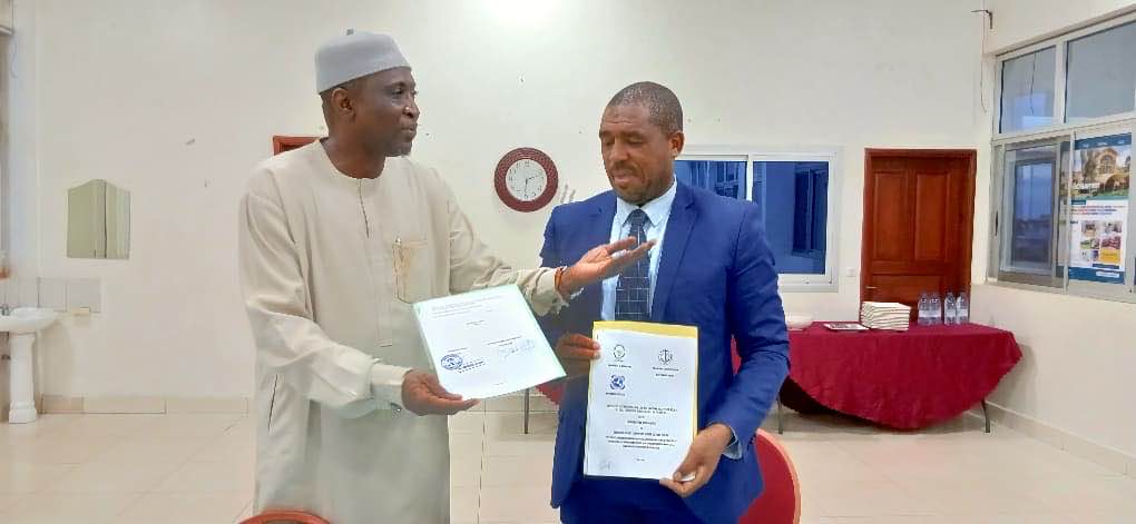 Rector of University of Maroua & the Director of Health Services exchanging MoU