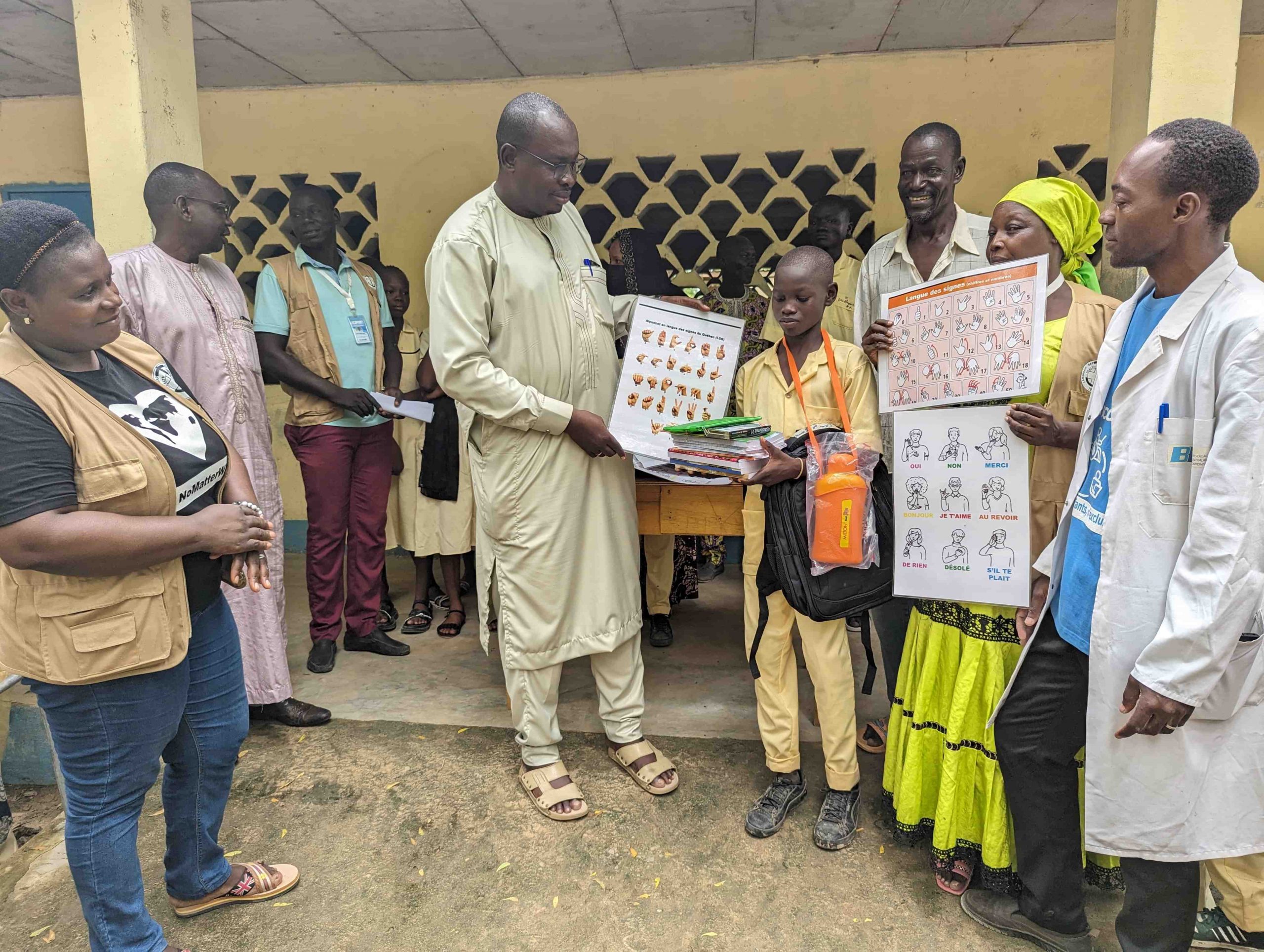 A student with a disability in GBHS Kousseri receiving complete school supply kit