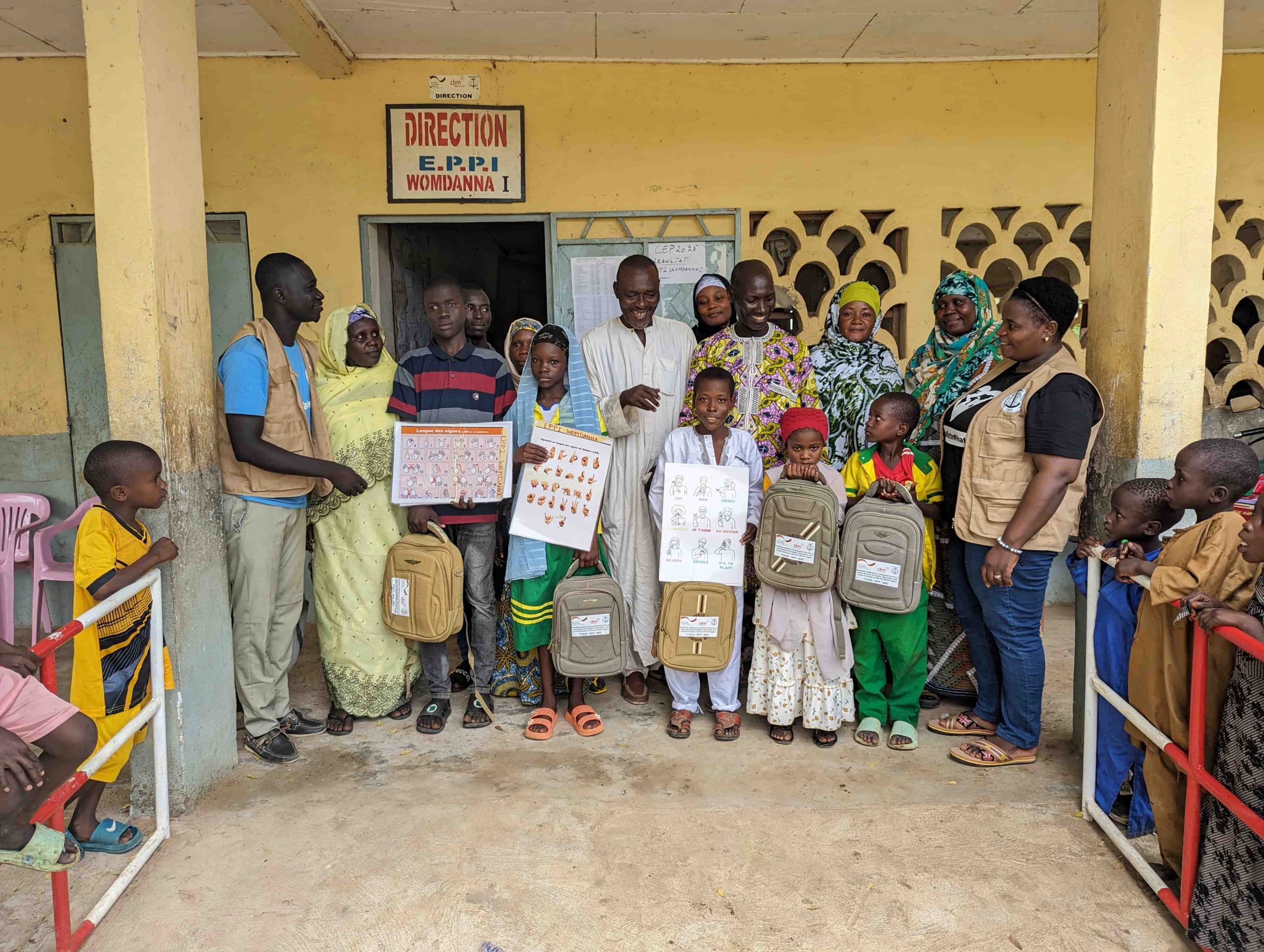 Beneficiaries pose as sign of gratitude