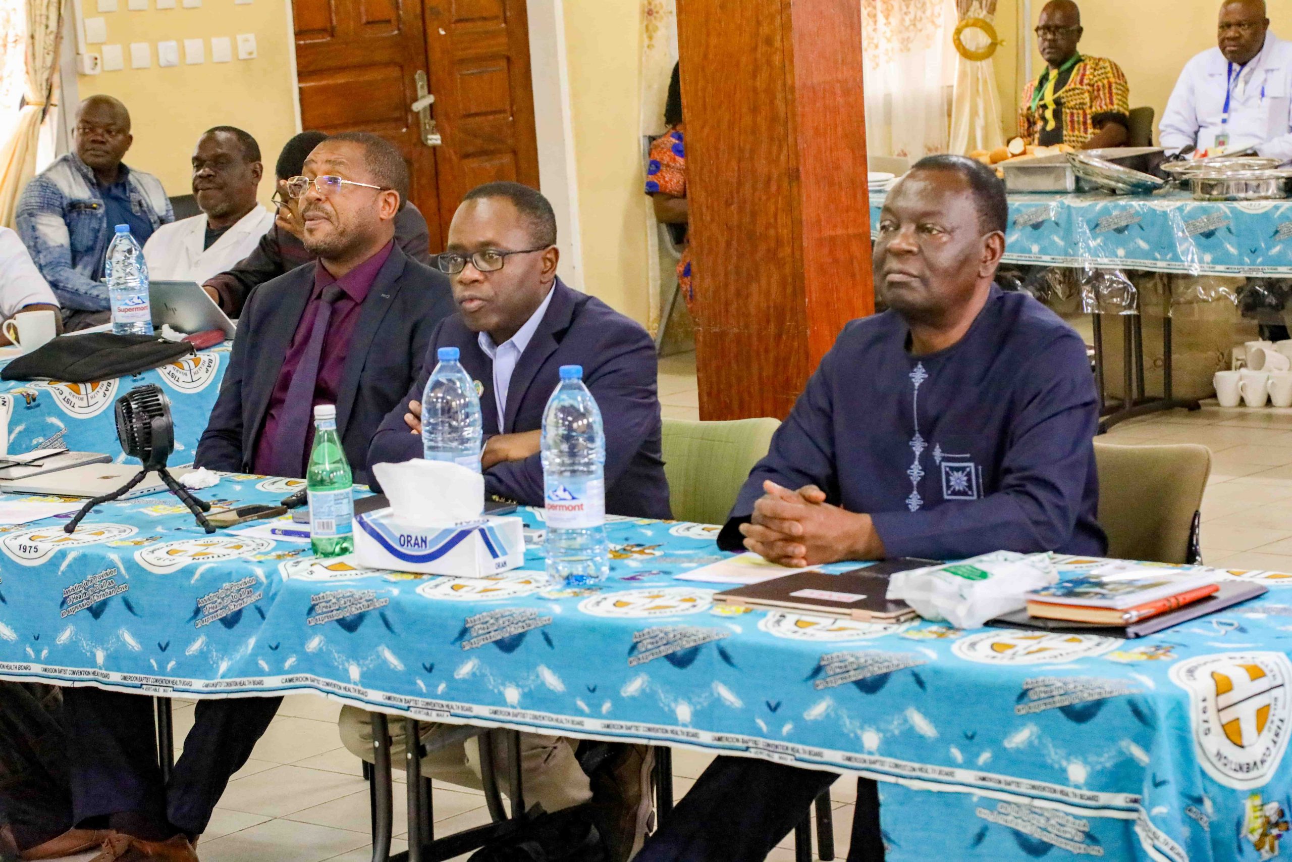 Children's Hospital donor, Dr. Dan Gwan-Nulla (center) flanked by the DHS, Mr. Ngum Samuel and Prof. Tih Pius