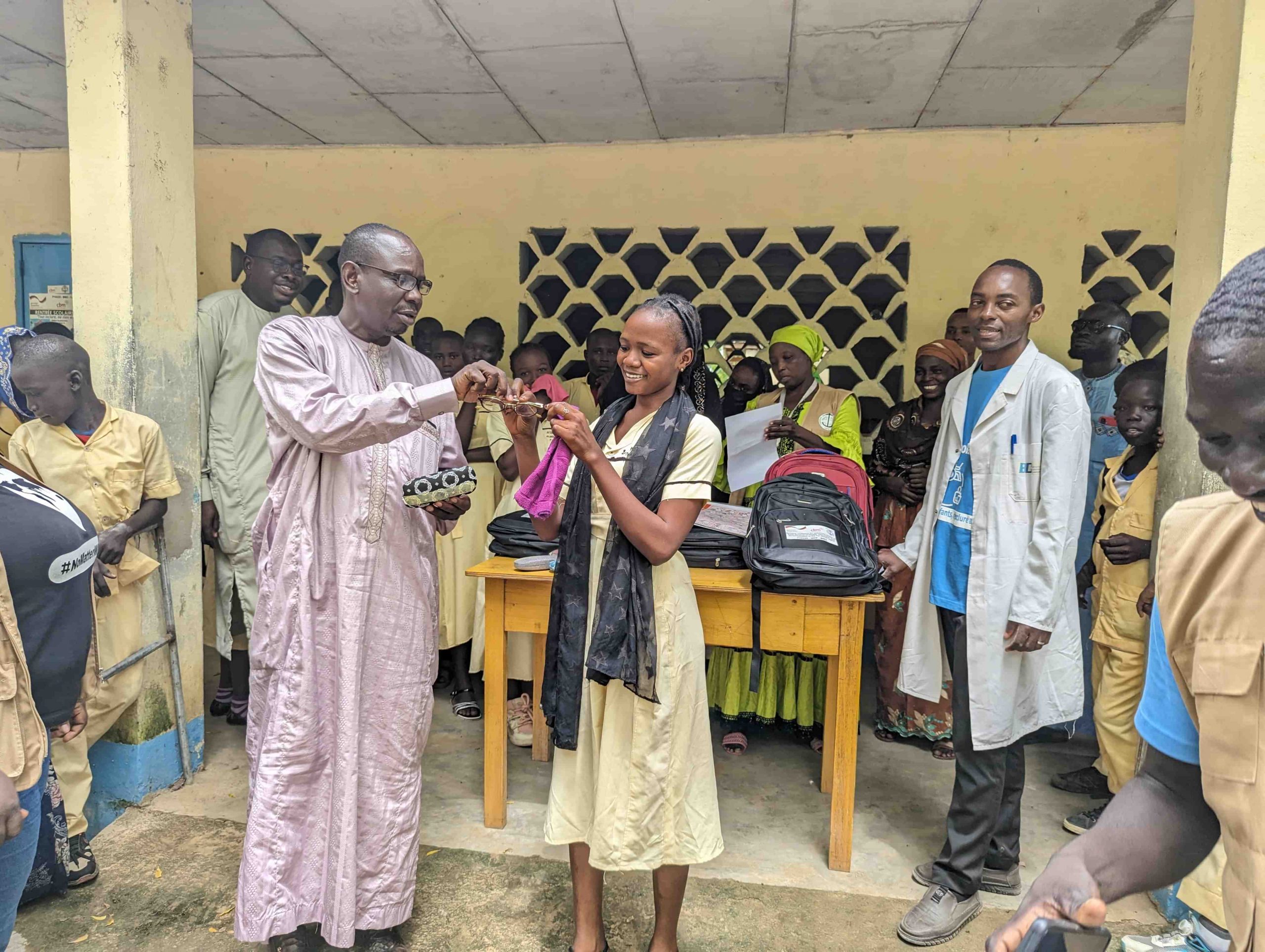 Handing over of a pair of corrective glasses to a student in GBHS Kousseri