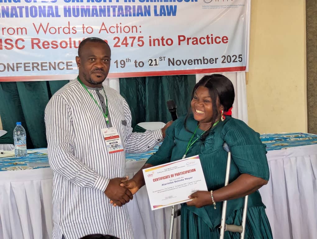 CBM Country Officer handing attestations