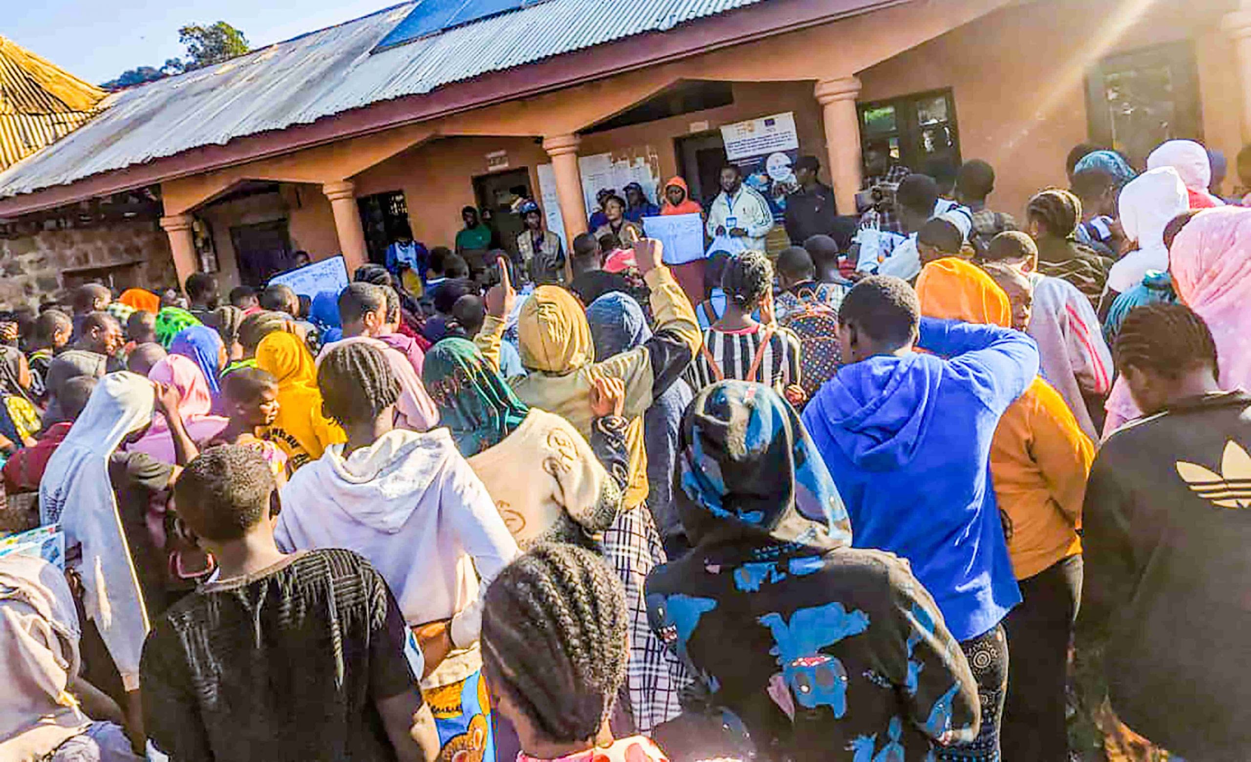 School children listens to talks from Youth Peer Educators