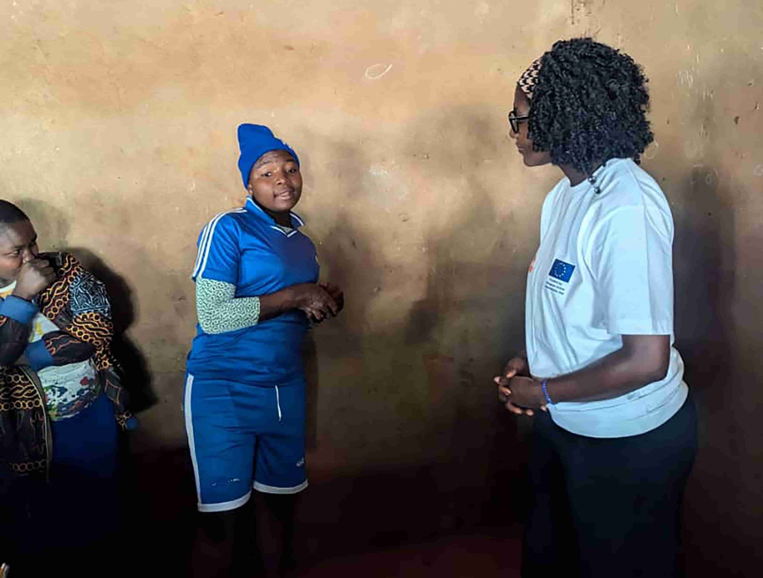 Yana Nicoline, a youth peer Educator, having a question and answer session with peers in Finkwi