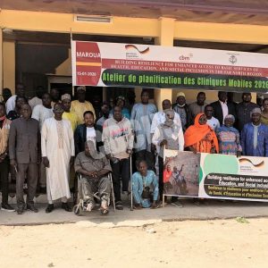 Stakeholders pose to immortalize planning meeting