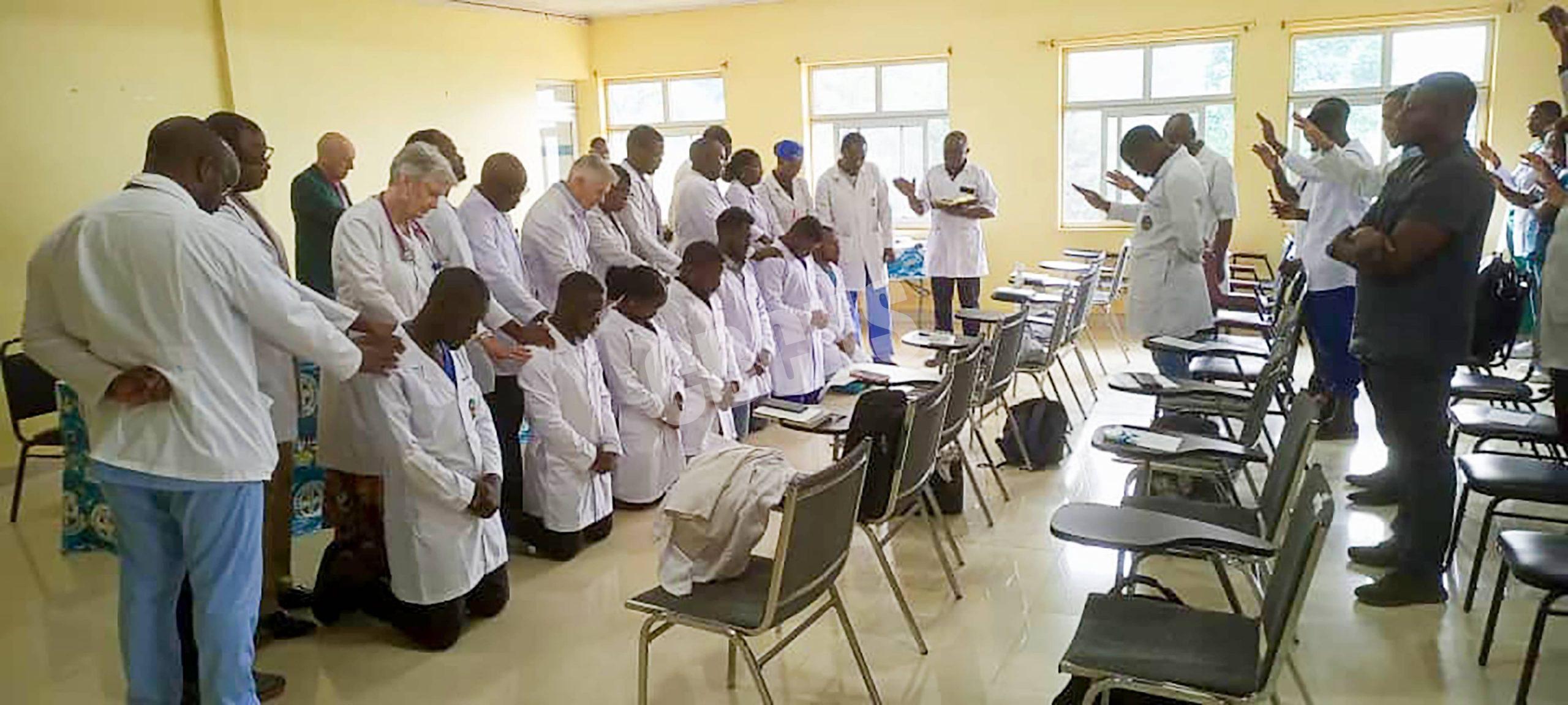 Laying of hands to initiate the residents