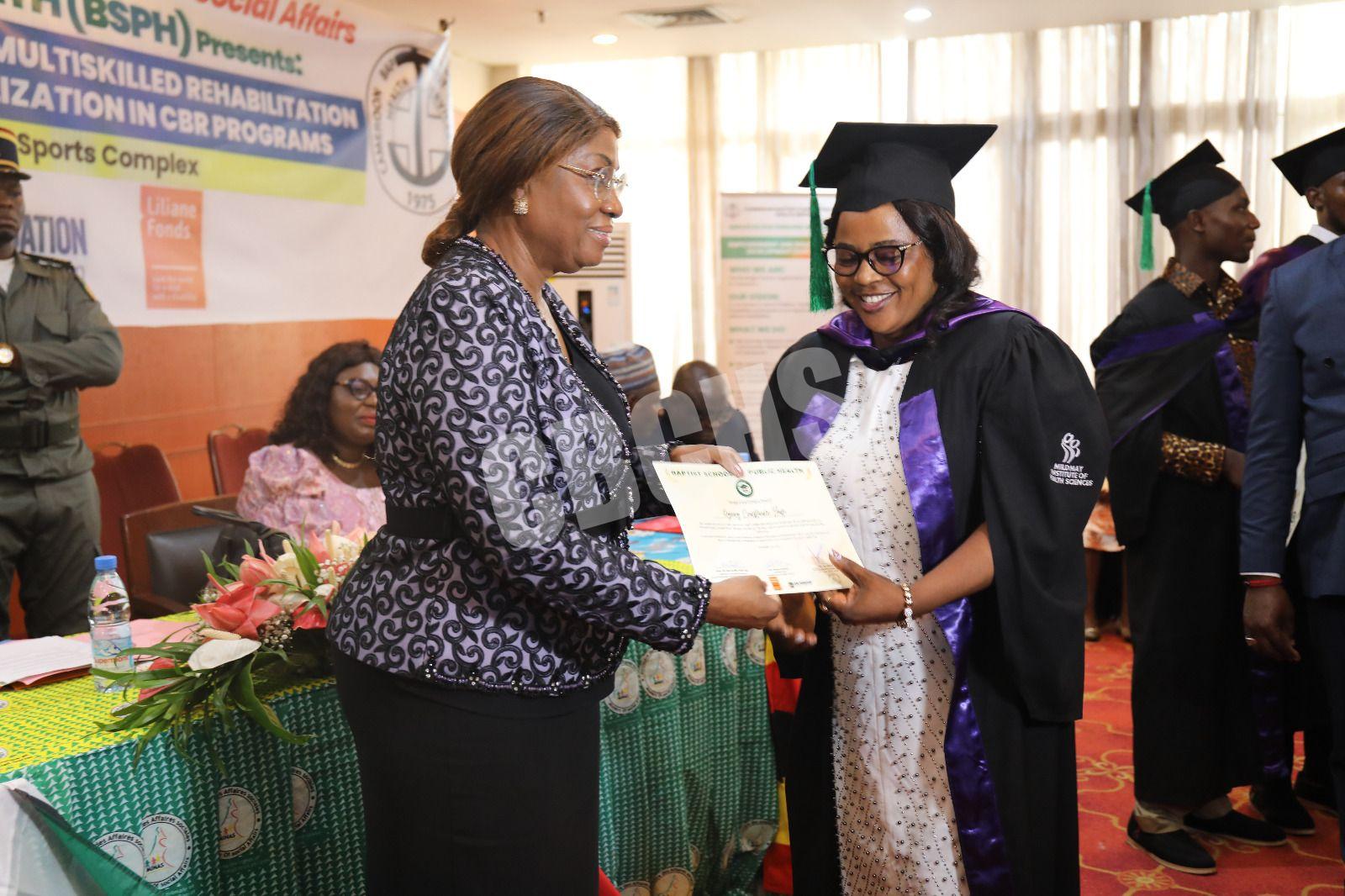 Receiving end of course certificate from the Minister of Social Affairs