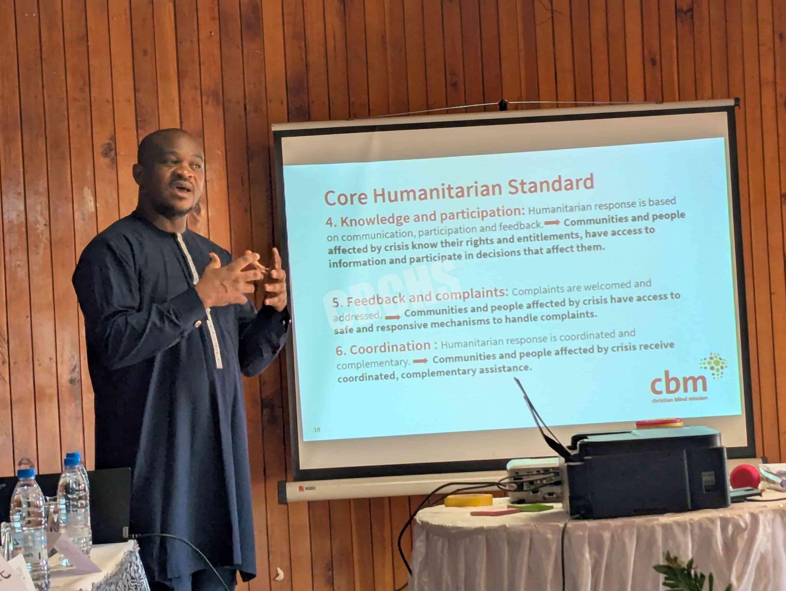 CBM Humanitarian Program Coordinator drilling participants on Humanitarian principles