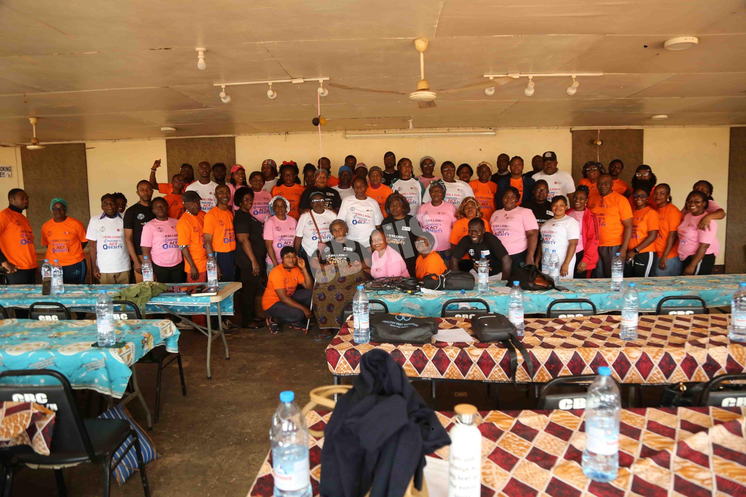 Coaches and Clents pose with with NCD Central Team