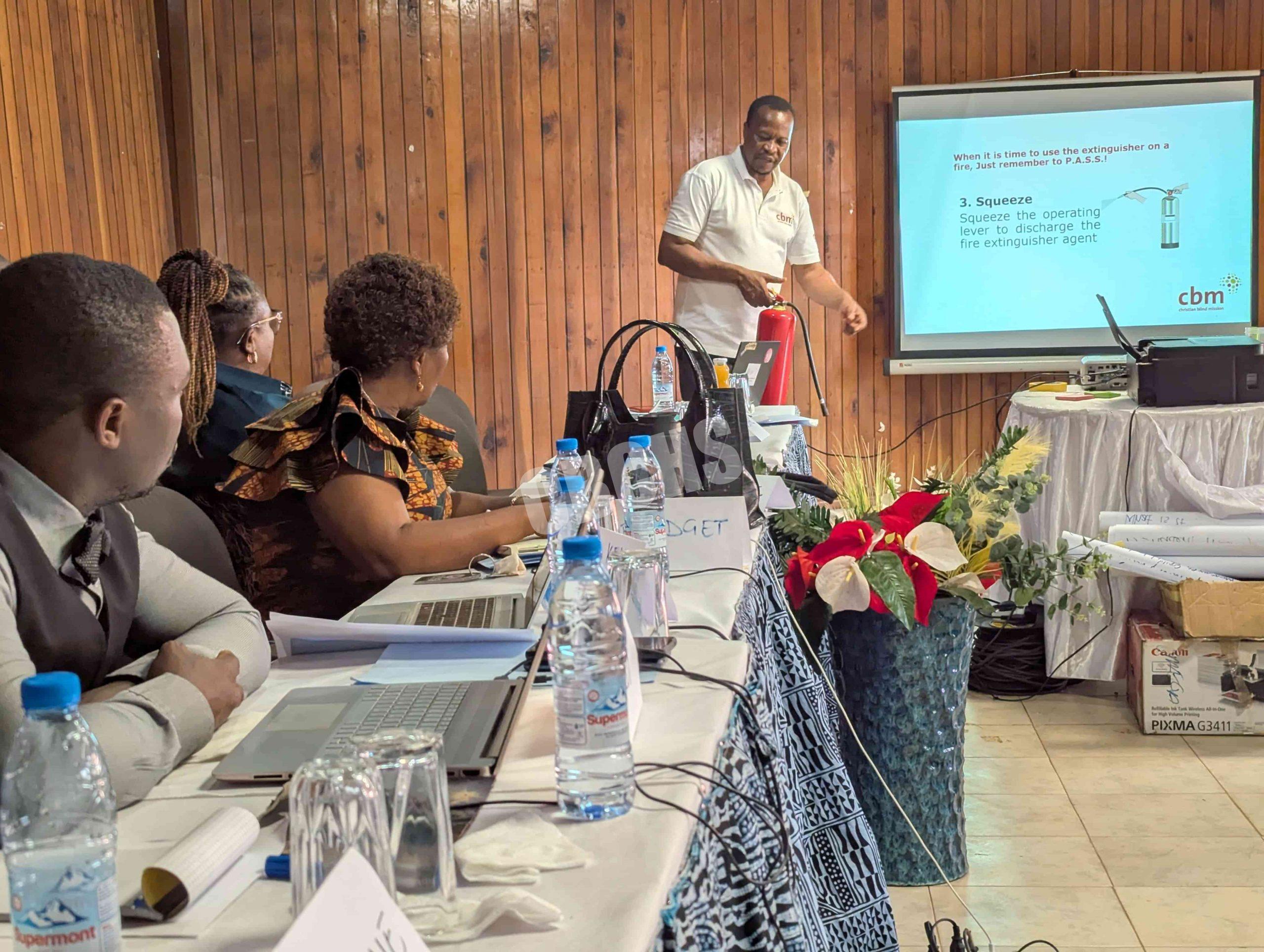 Participants being trained on fire management