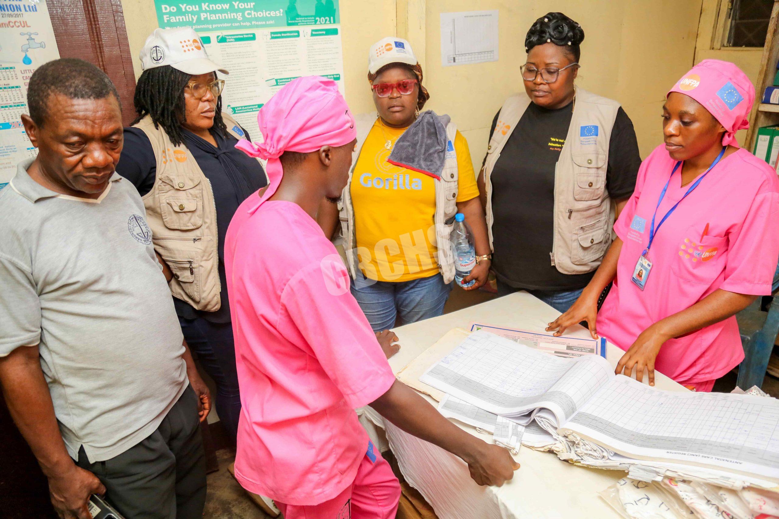 The M&E team evaluating Records and registers