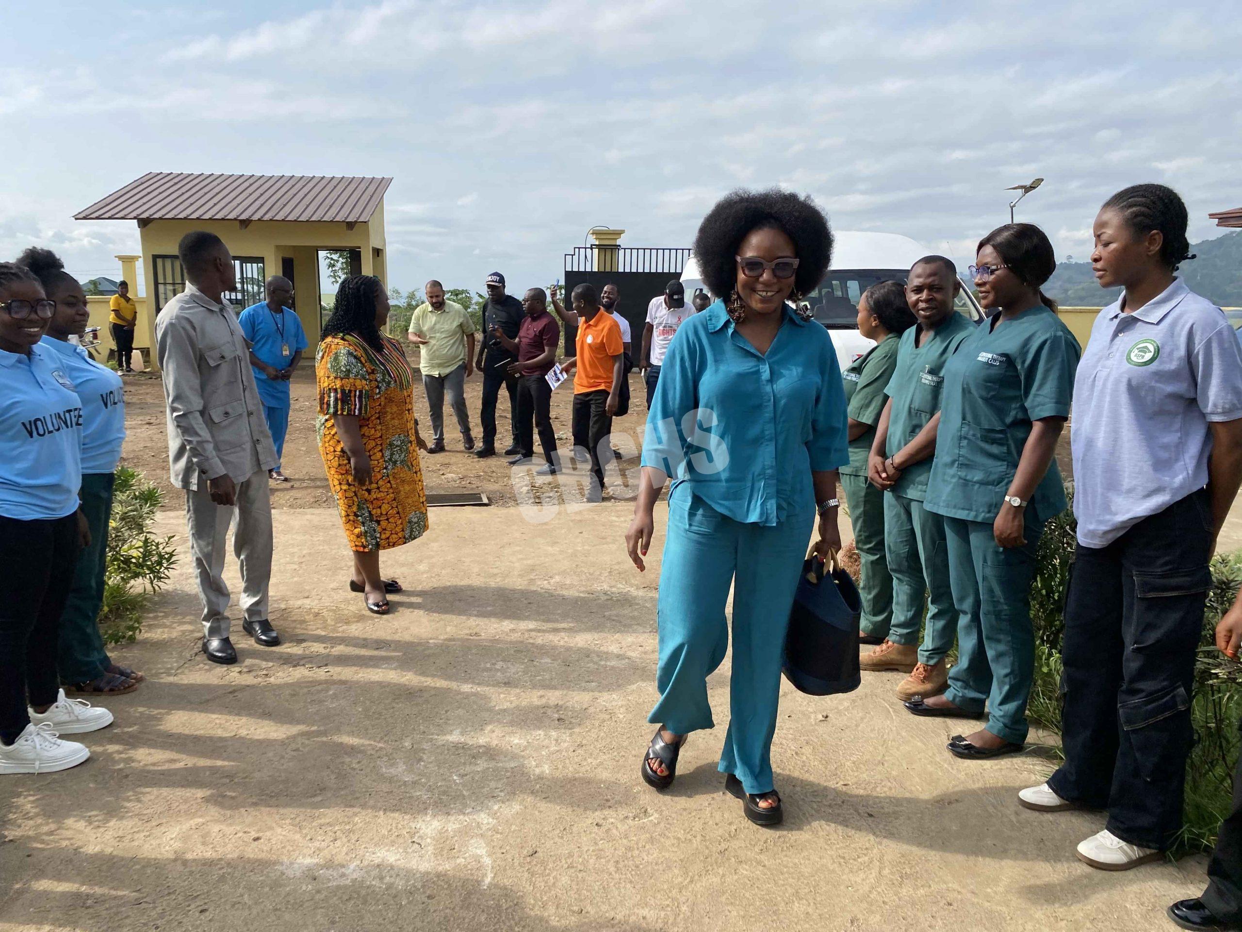 EDID Program Manager, Mrs. Agho Glory leading the visitors into the RTCE campus