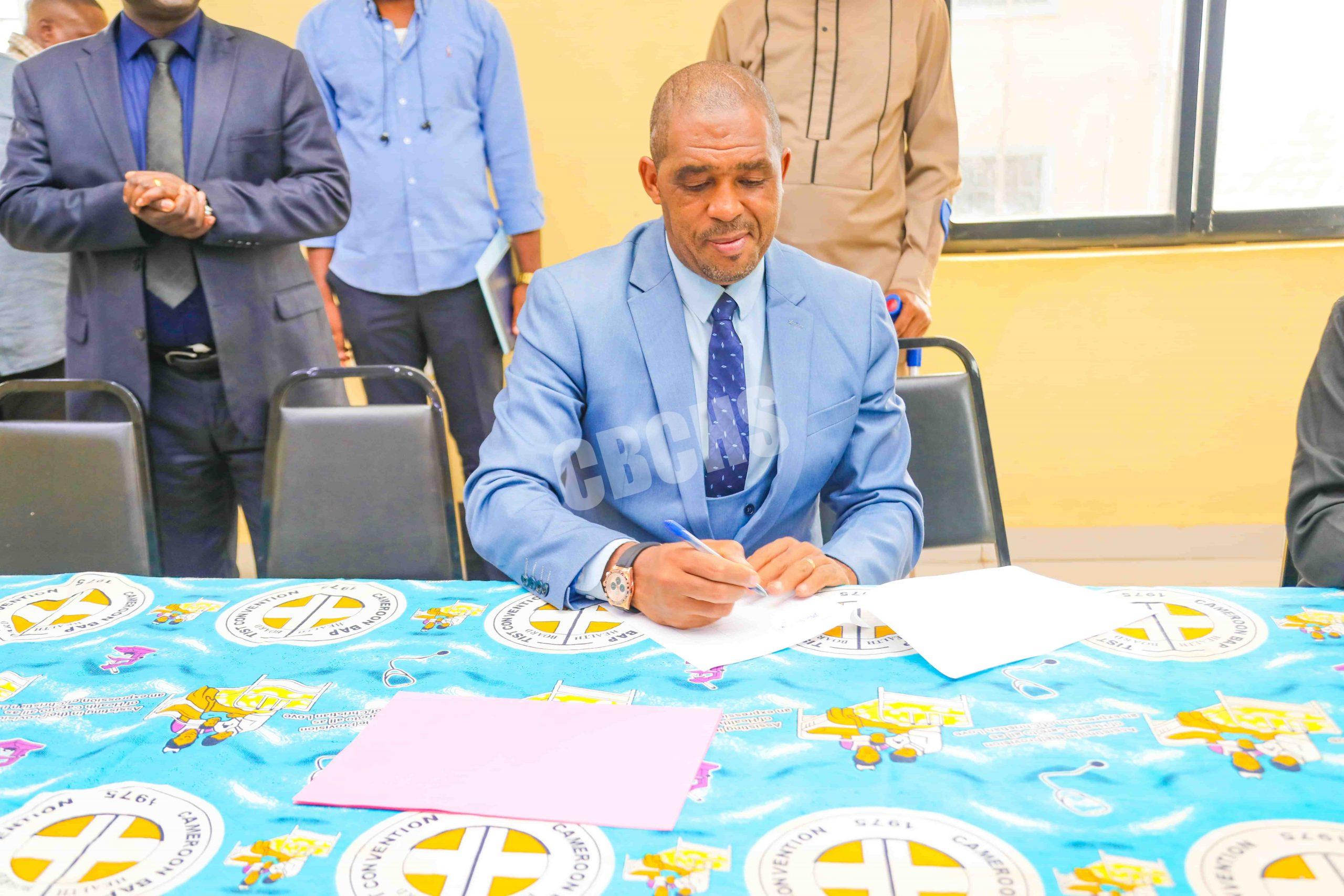 Director of Health Services happily receiving New Structure for Ndu Baptist Hospital