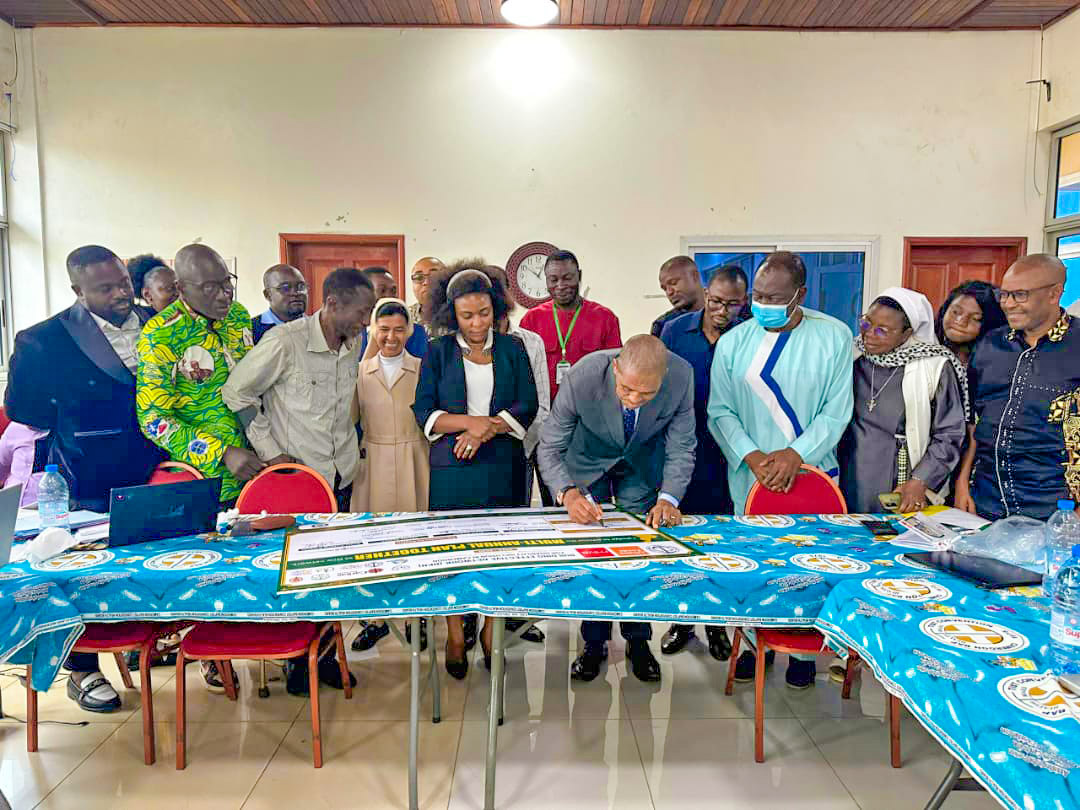 Stakeholders signing commitment of mutual collaboration between partner organizations