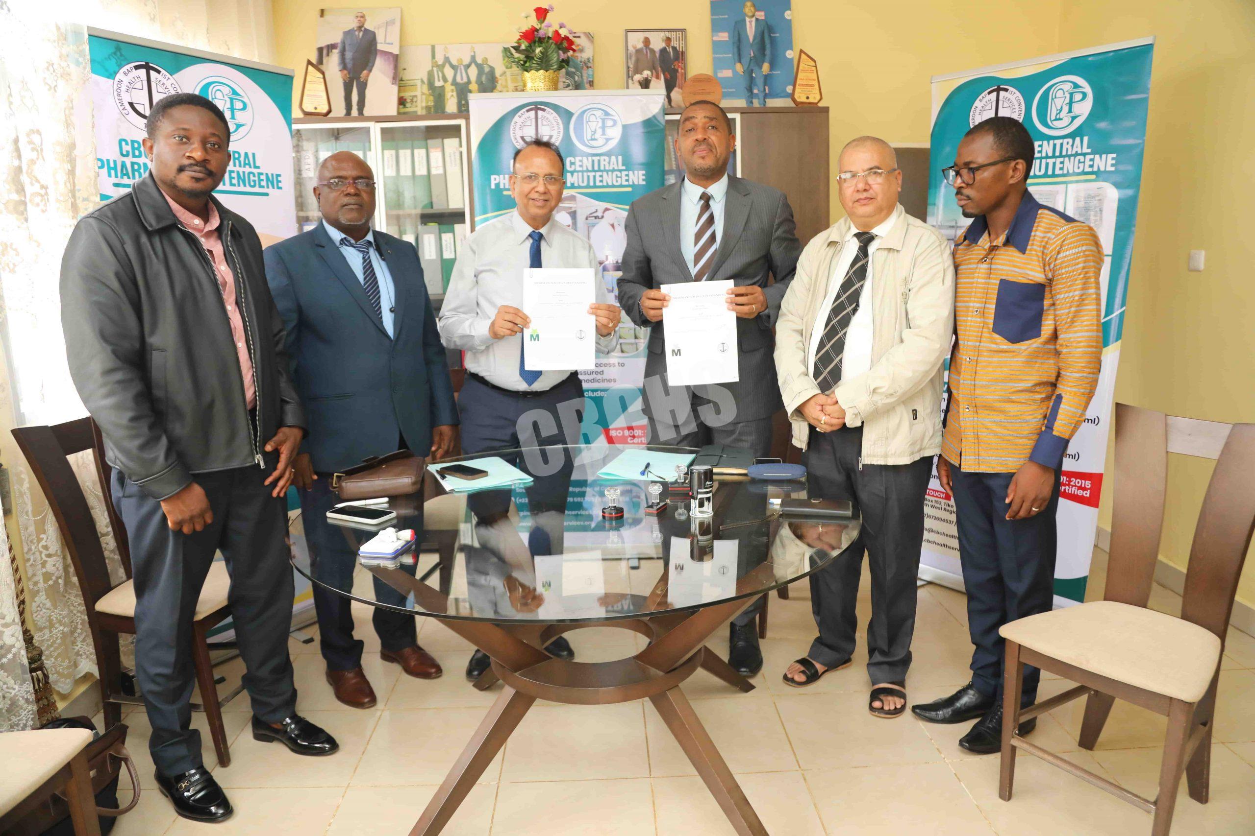 Both parties brandish signed MoU