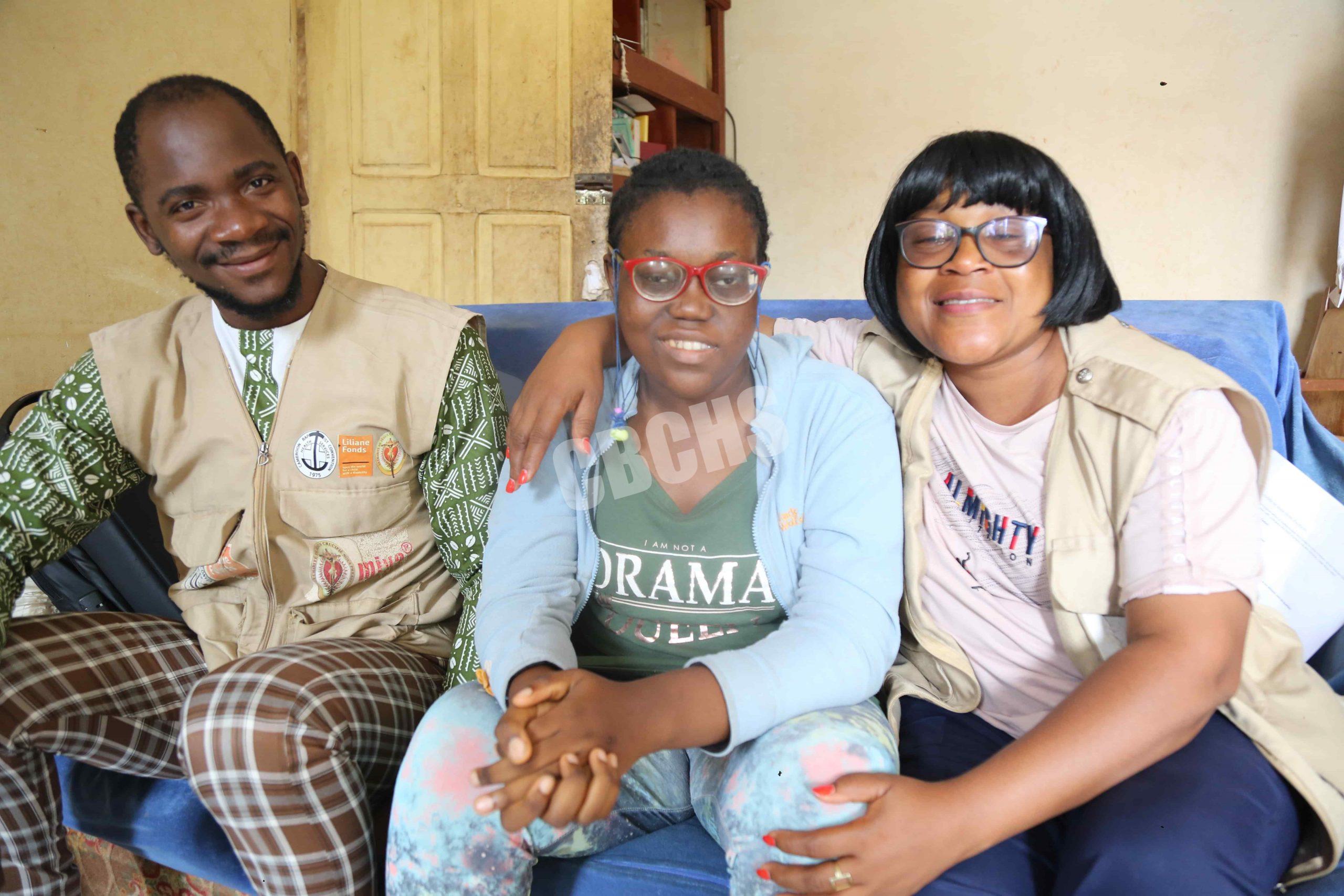 Esthelle and two EDID Program field staff share bright smiles—a heartfelt reflection of the progress and support that has transformed her life.