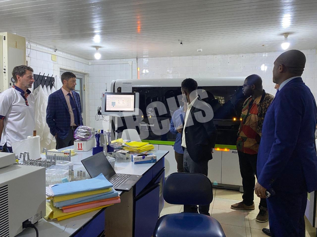 Members of COSECSA-PAACS delegation review laboratory operations during their visit